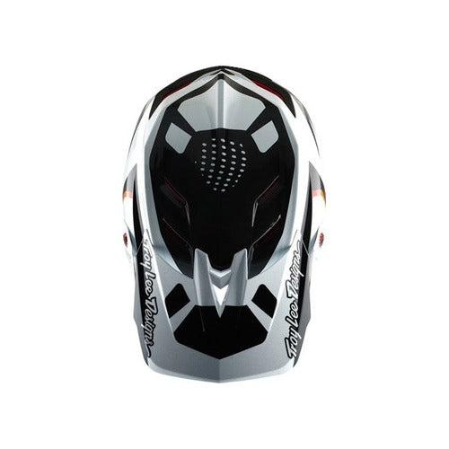 The TLD 25.1 D4 Carbon Helmet (MIPS) in Optic Black, with a geometric design and "Troy Lee Designs" on the sides, is shown from above—ideal for downhill BMX adventures.