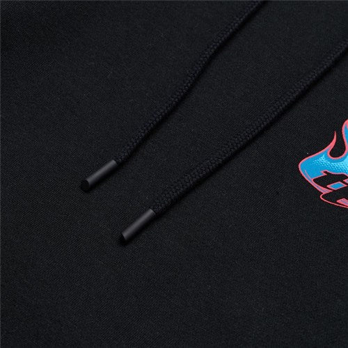 Close-up of the TLD 25.1 Torched Hoodie in black with drawstrings, featuring a subtle flame graphic and text on the right, ideal for chilly winter days.