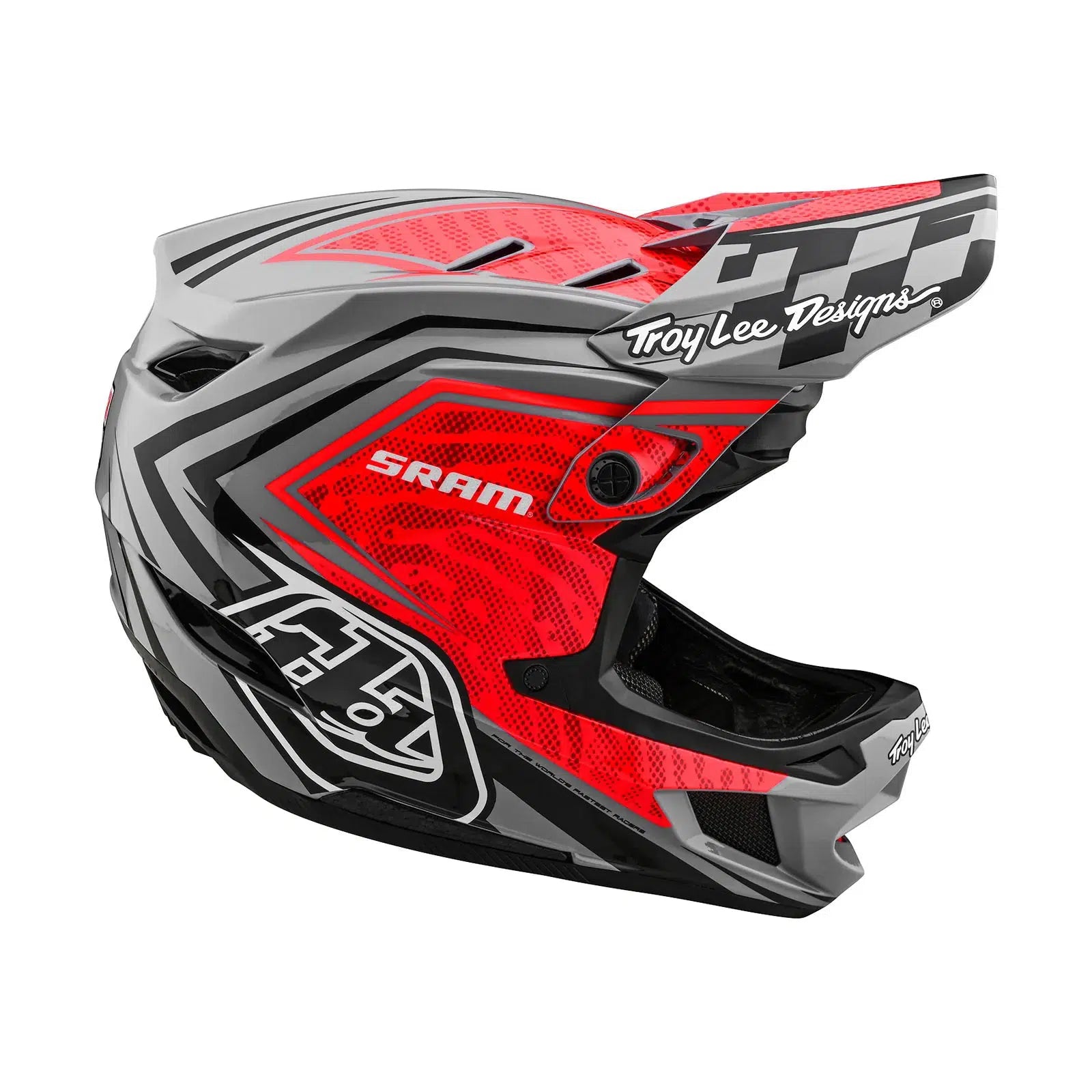A TLD D4 Carbon AS Helmet W/MIPS SRAM Red / Black with a checkered design on it.