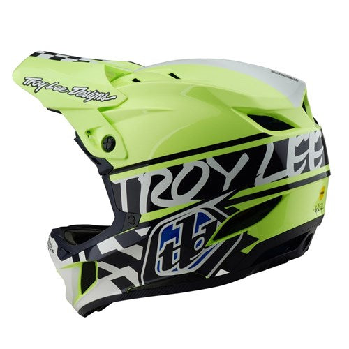 Navy and Glo Yellow BMX helmet with "Troy Lee Designs" logo, featuring a visor, geometric patterns, and MIPS protection for enhanced safety.