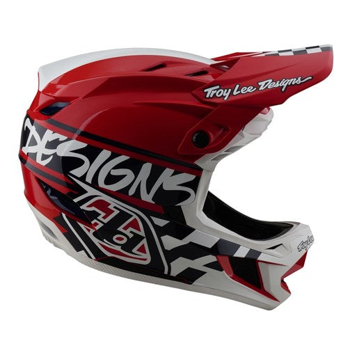 The TLD D4 Polyacrylite Helmet (MIPS) in Fifty-50 White/Red features bold graphics and "Troy Lee Designs" on the visor, incorporating Mips® C2 technology for enhanced safety, ideal for downhill BMX adventures.