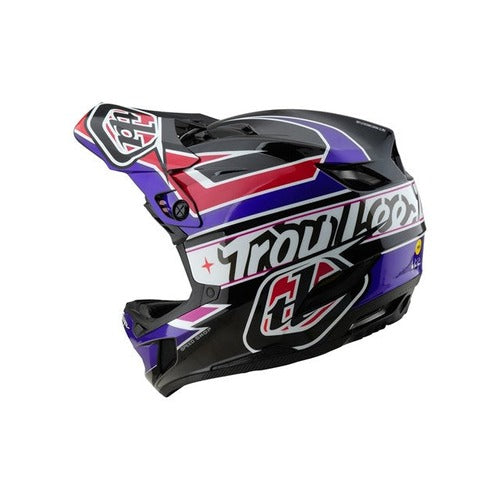 The TLD D4 Polyacrylite Helmet (MIPS) in Linear Black is a purple, black, and red full-face helmet with a visor and "Troy Lee" branding.