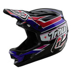 The TLD D4 Polyacrylite Helmet (MIPS) in Linear Black boasts a striking black and purple design with red and white accents, made from a durable polyacrylite shell. It features Troy Lee Designs branding and includes MIPS brain protection for enhanced safety.