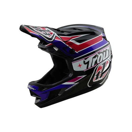 The TLD D4 Polyacrylite Helmet (MIPS) in Linear Black boasts a striking black and purple design with red and white accents, made from a durable polyacrylite shell. It features Troy Lee Designs branding and includes MIPS brain protection for enhanced safety.