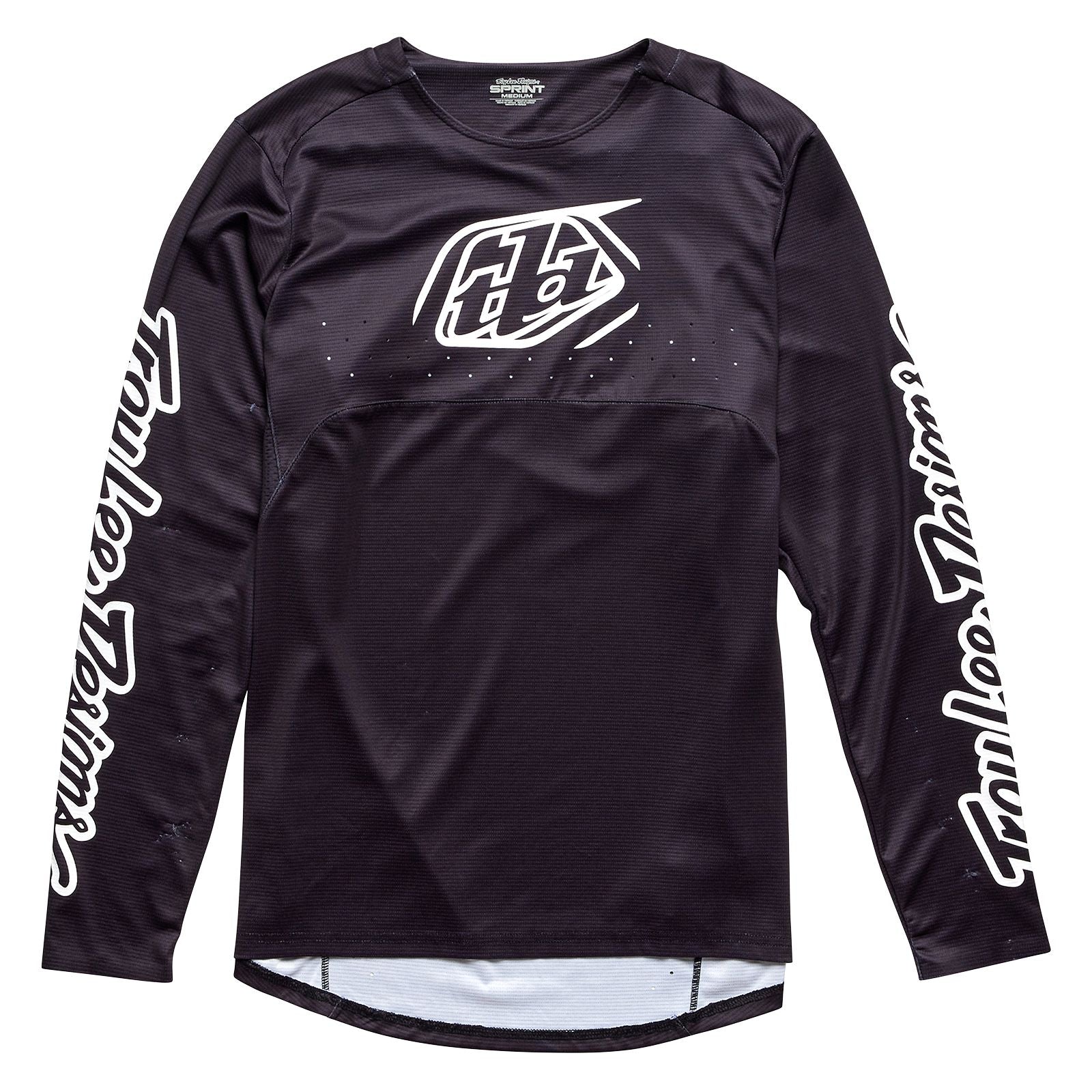 Long-sleeved TLD Youth Sprint Jersey Icon Black with race-inspired construction, featuring graphic design and branded elements on a white background.