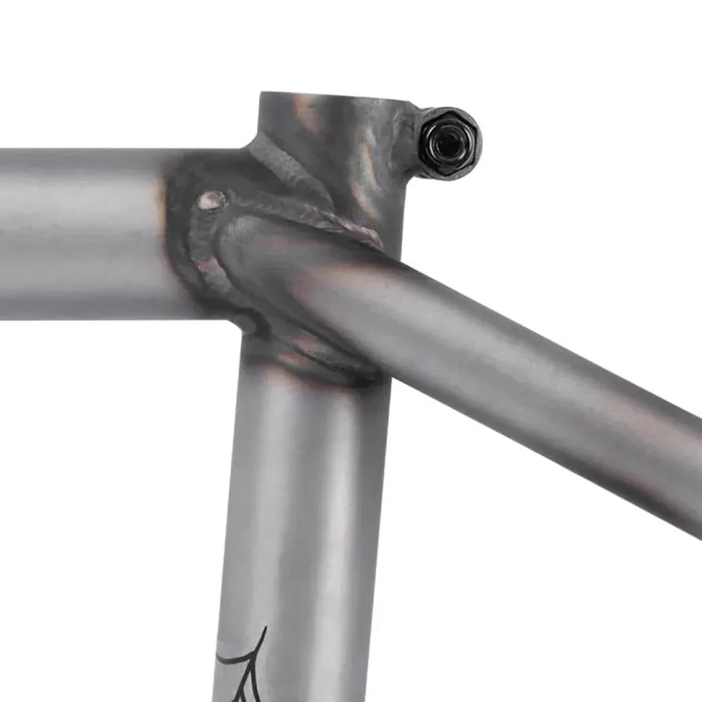 Close-up of the welded seat tube, top tube, and seat stay joint on a Subrosa Rose Frame 4130 chromoly BMX frame.