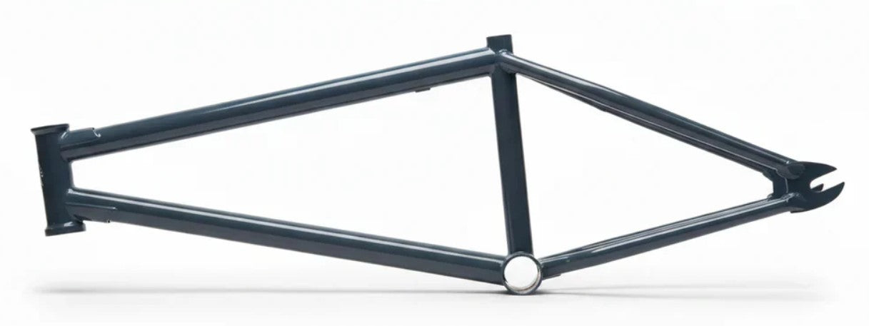 A United Pro Model Frame (Marius Dietsche Signature) in dark gray, made from high-quality 4130 Sanko Japanese tubing, is displayed lying horizontally on a white background, with no wheels, seat, or handlebars attached.