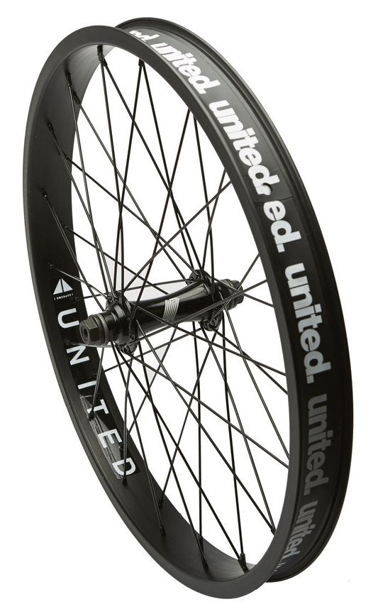 A black United Supreme front wheel with visible spokes and branding on the double-walled rim.