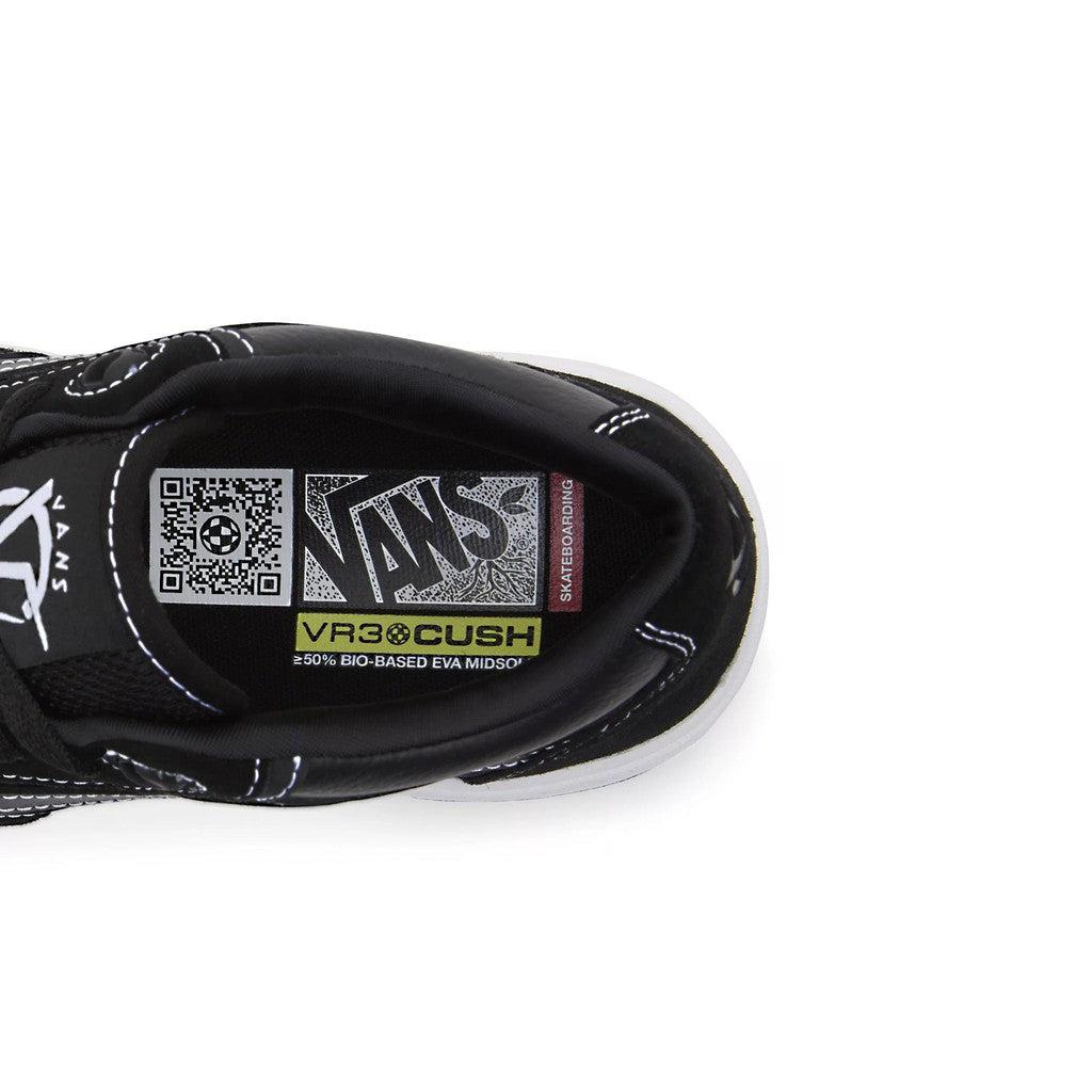 A black and yellow Vans Rowan 2 Shoes on a white background, designed for skateboarding with impact protection.