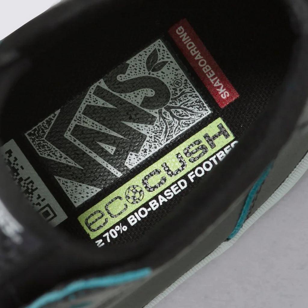 A close up of a sustainable Vans The Lizzie Wearaway High Top shoe with the iconic logo on it.