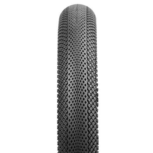 The Vee Speedster ST 20 Inch Tyre features a honeycomb center and angled grooves, creating a tread pattern ideal for BMX racing when viewed from above.