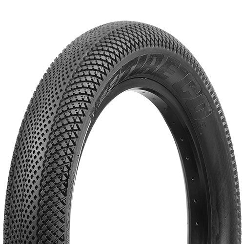 A close-up view of the Vee Speedster ST 20 Inch Tyre in black, showcasing its textured tread with a honeycomb center and visible sidewall branding—ideal for BMX racing.