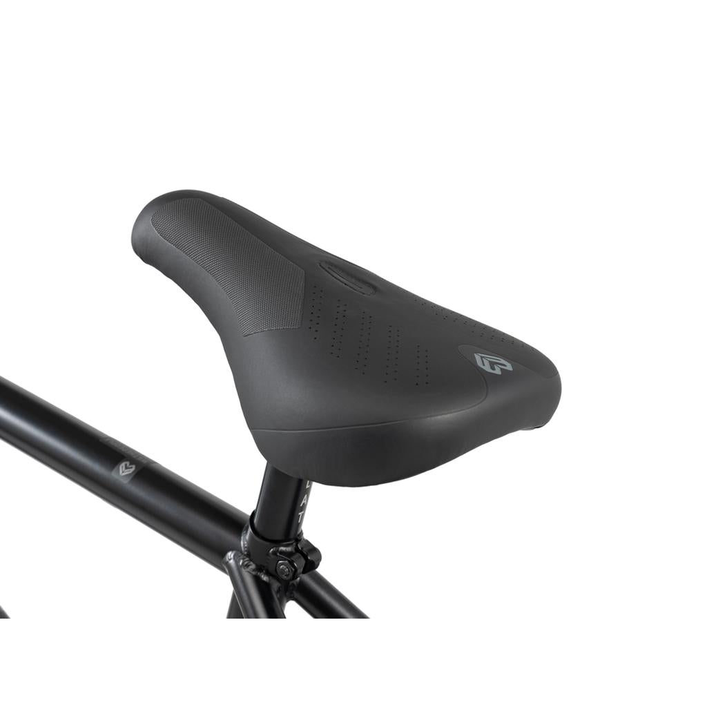 Close-up of a black bicycle saddle on a black seat post with a textured surface and subtle branding, perfectly matching the carbon fibre rims of the Wethepeople 20 inch Envy Carbonic LTD Bike.