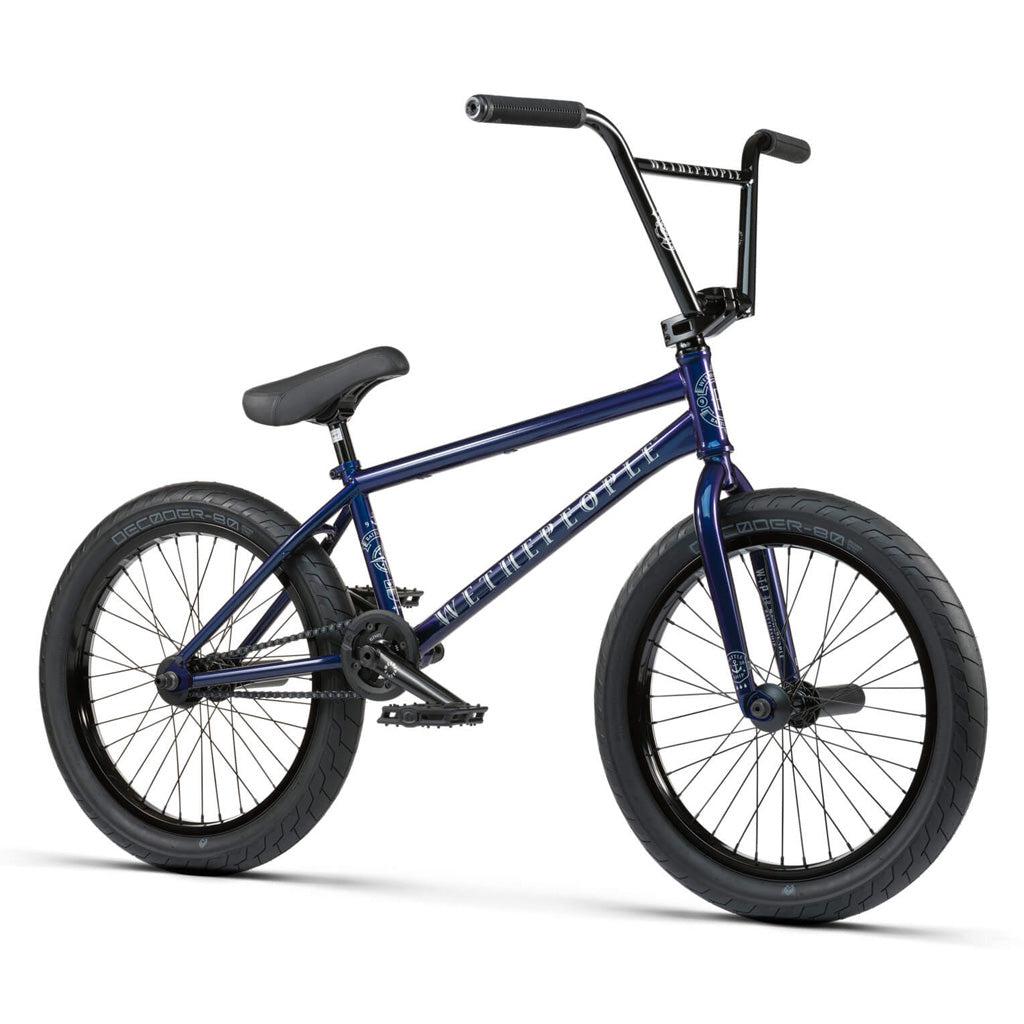 The Wethepeople Battleship 20 Inch Bike, featuring a blue Chromoly frame, black tires, black seat, and raised handlebar, is displayed against a white background.