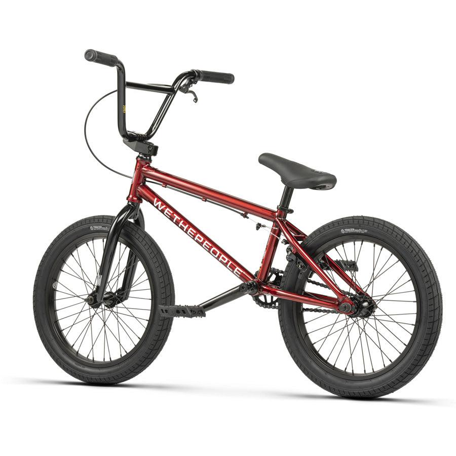 The Wethepeople CRS 18 Inch Bike is a red BMX with black handlebars, seat, and tires featuring "WETHEPEOPLE" branding on the frame; ideal for kids and shown against a white background.