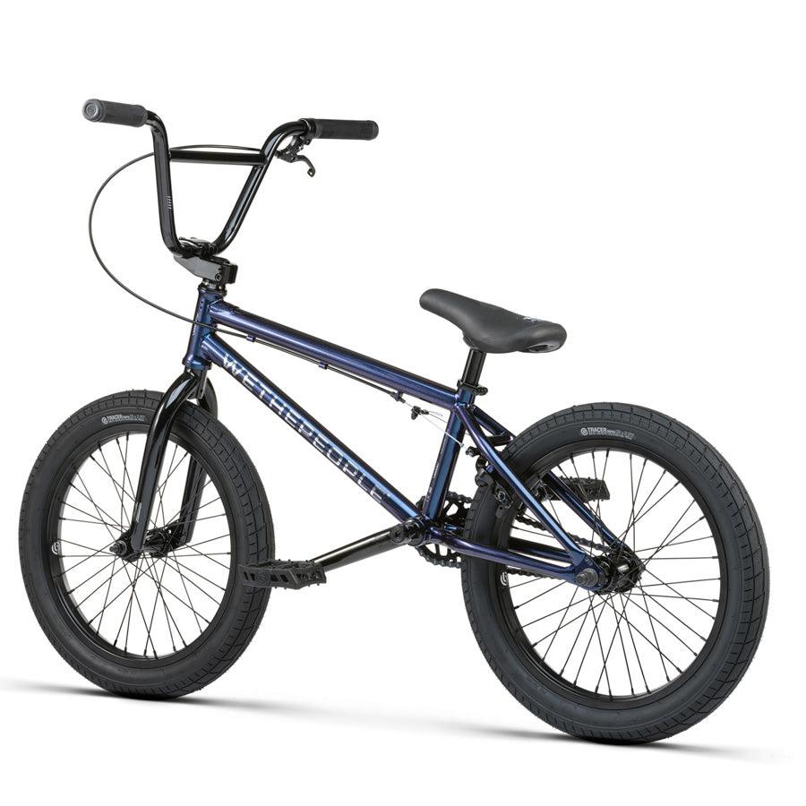 The Wethepeople CRS 18 Inch Bike, featuring a blue frame with black handlebars, seat, and tires, is displayed from a side angle against a white background.