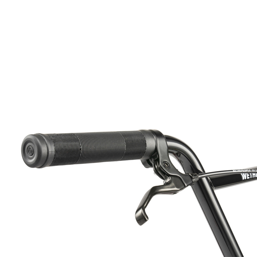Close-up of the Wethepeople CRS 18 Inch Bike’s handlebar, featuring a black rubber grip and metal brake lever—ideal details for this BMX bike, shown on a white background.