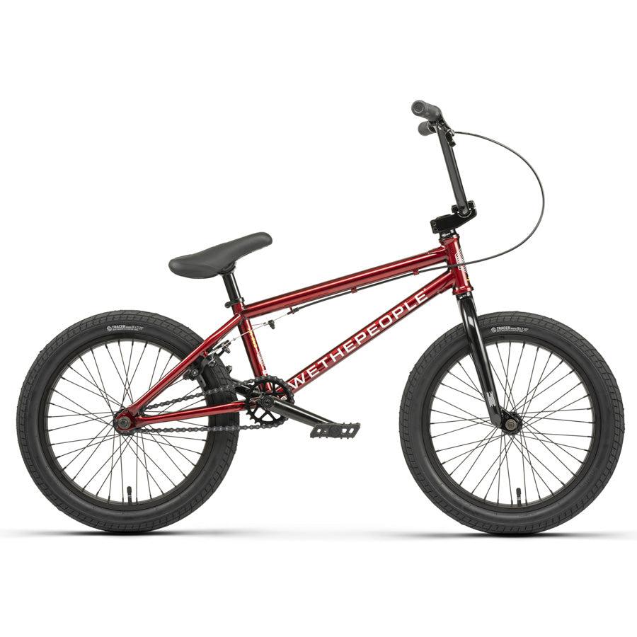 The Wethepeople CRS 18 Inch Bike features a red frame, black tires, black seat, silver handlebars, and "Wethepeople" branding—making it an ideal 18-inch kids BMX bike.