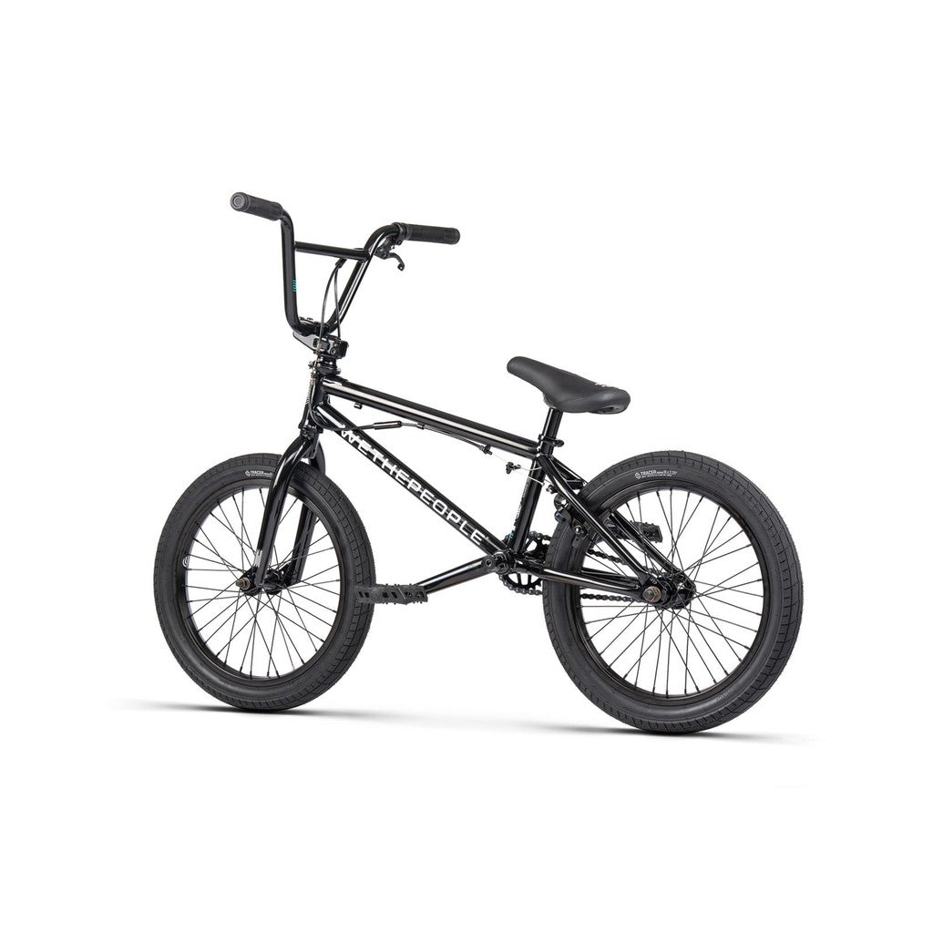 The Wethepeople CRS FS 18 Inch Bike is a black BMX freestyle bike featuring a compact 18" frame, thick tires, upright handlebars, and gyro-equipped brakes, displayed on a plain white background.