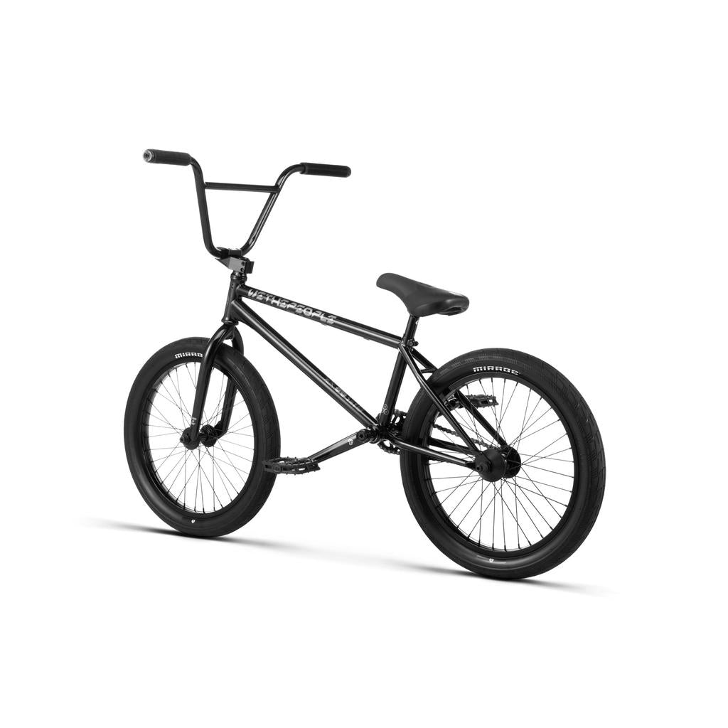 The Wethepeople Envy 20 Inch Bike, a black BMX with a sturdy frame, wide handlebars, thick tires, single gear, and quality Eclat parts, is shown on a white background.