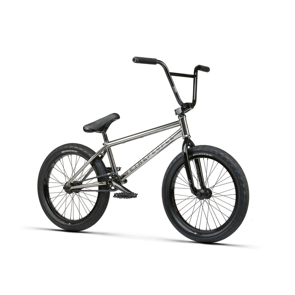 The Wethepeople Envy 20 Inch Bike is a BMX masterpiece with a metallic frame, black handlebars, seat, and wheels.