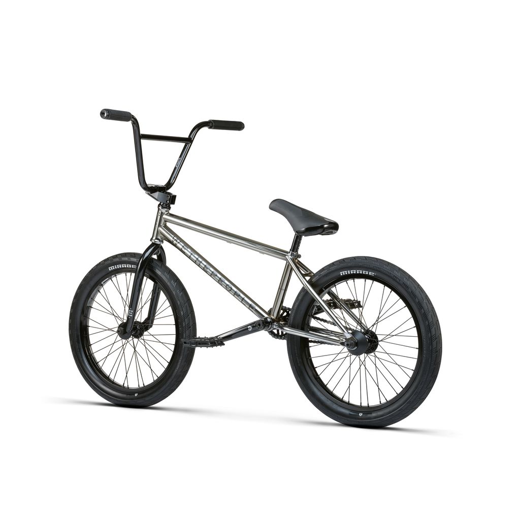 The Wethepeople Envy 20 Inch Bike, a black BMX with a sleek frame and Eclat Tibia Cranks, has black tires and a cushioned seat, pictured from the rear on a white background.