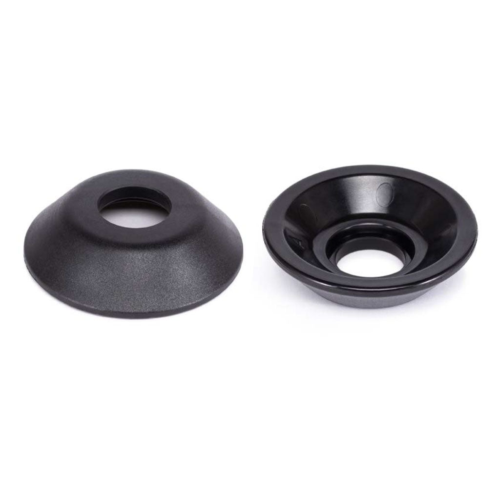 The WETHEPEOPLE Helix/Hybrid Rear Hub Guard is shown in black nylon, round with central holes, viewed from the top and side on a white background—ideal for smooth grinding, especially on Helix hub setups.