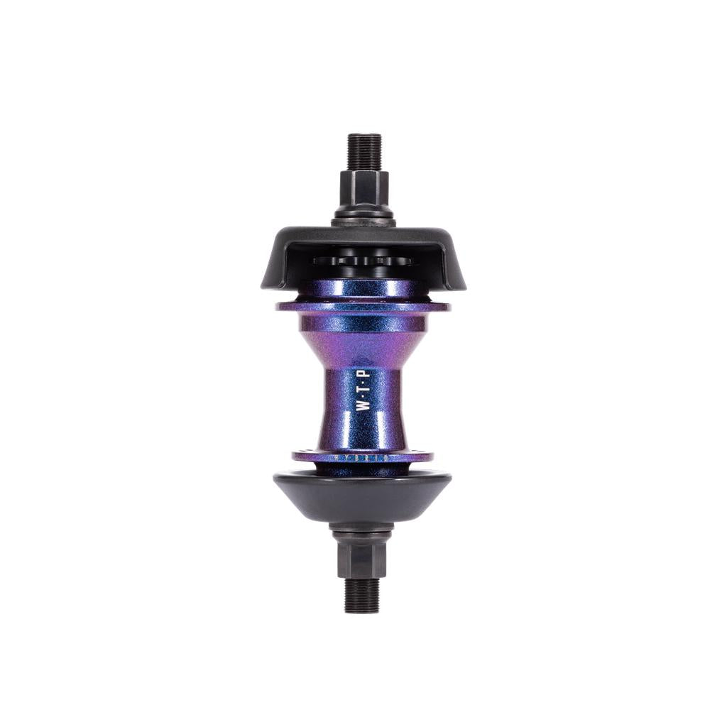 The Wethepeople Hybrid Hub is a purple and black Freecoaster with visible ball bearings and axle threads, marked with "WTP," and features a patented magnetic pawl retention system for improved performance.