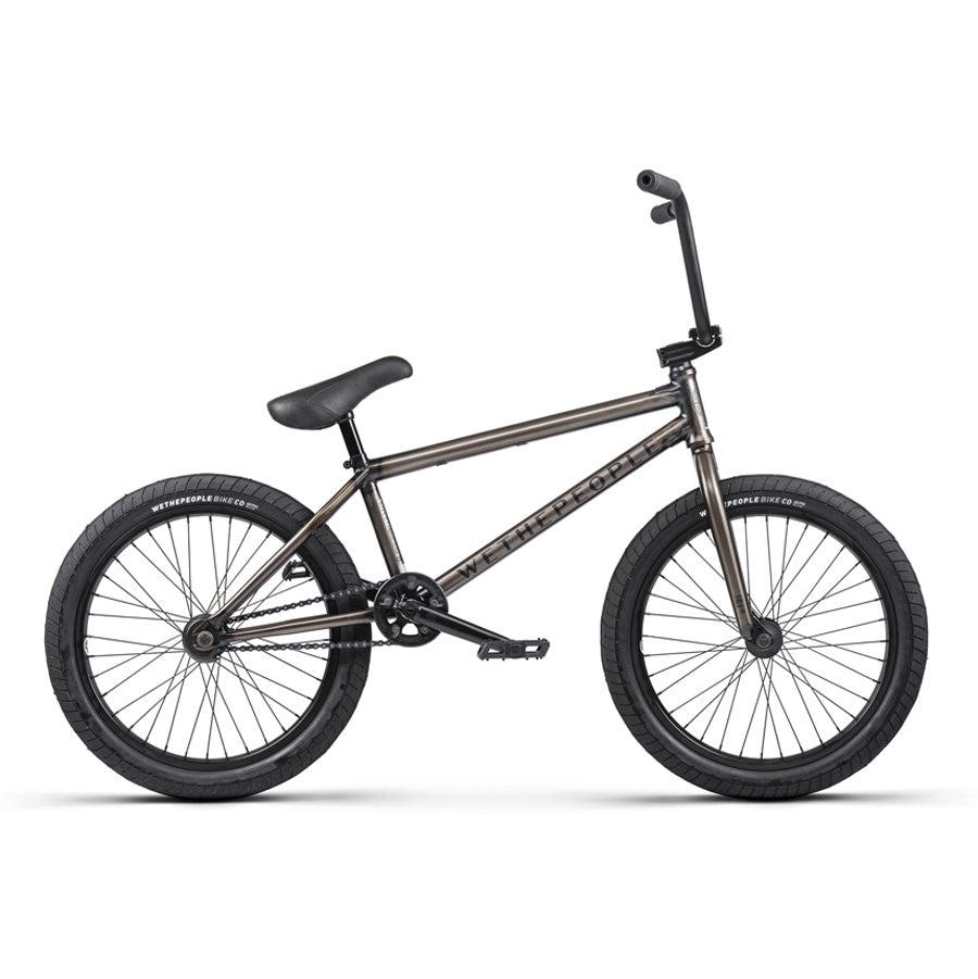 A black Wethepeople Justice 20 Inch Bike featuring a sleek frame, thick tires, a padded seat, and adjustable handlebars, positioned on a neutral background.