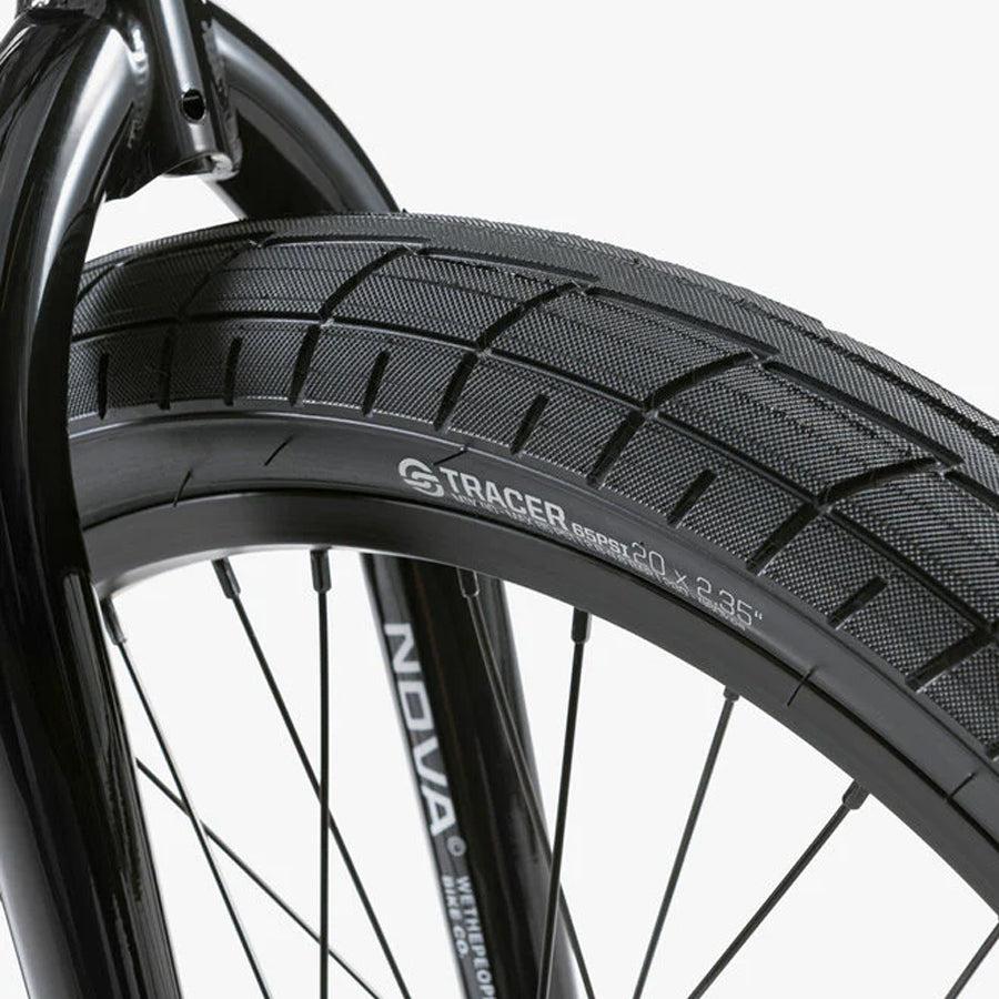 A close up of a black Wethepeople Nova 20 Inch BMX Bike tire.