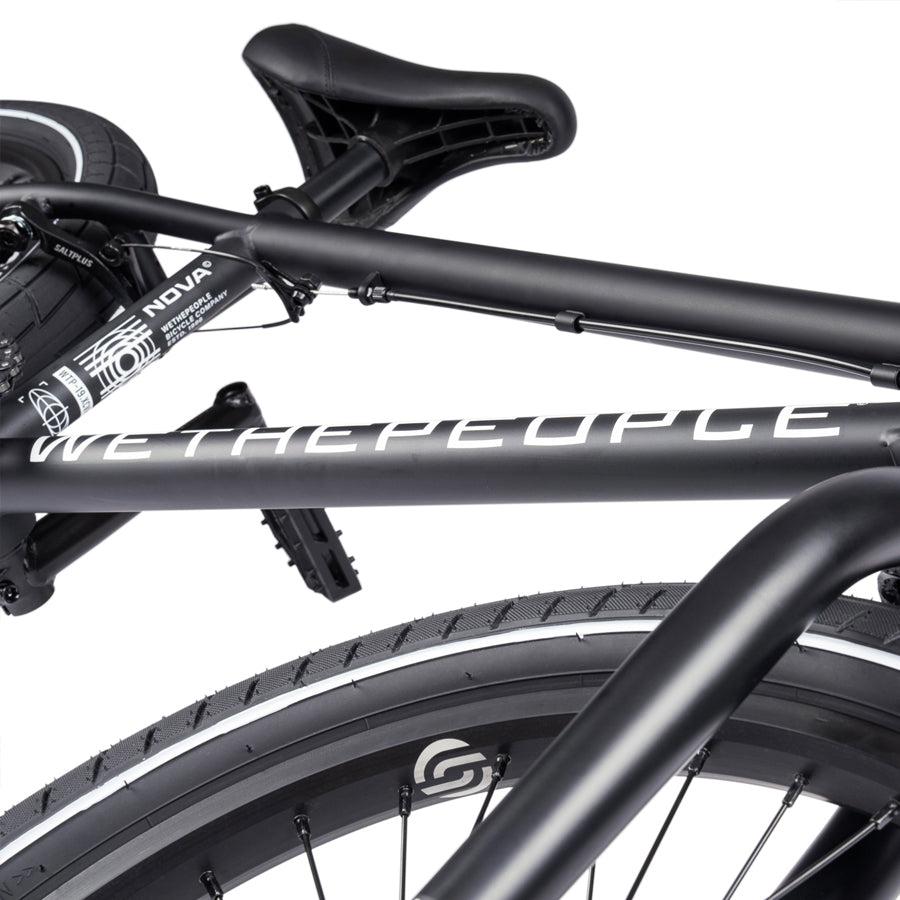 A black Wethepeople Nova 20 Inch BMX bike with the words wetpeace and Nova on it.