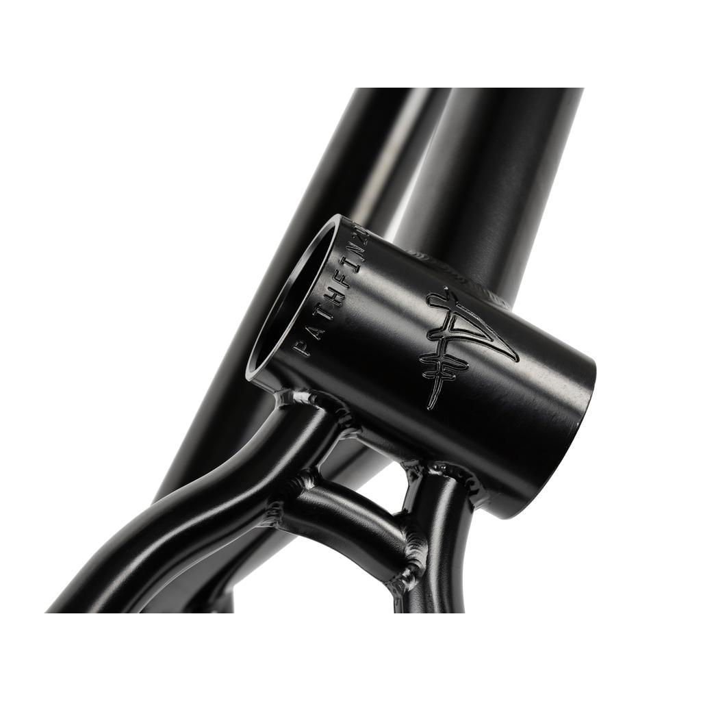 Close-up of the Wethepeople Pathfinder Frame in matte black, showing an engraved logo and the word "PATCH" on the metal tubing.