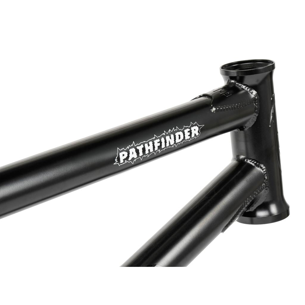 Close-up of the Wethepeople Pathfinder Frame in matte black, featuring Felix Prangenberg’s signature design with "Pathfinder" printed on the top tube near the head tube.