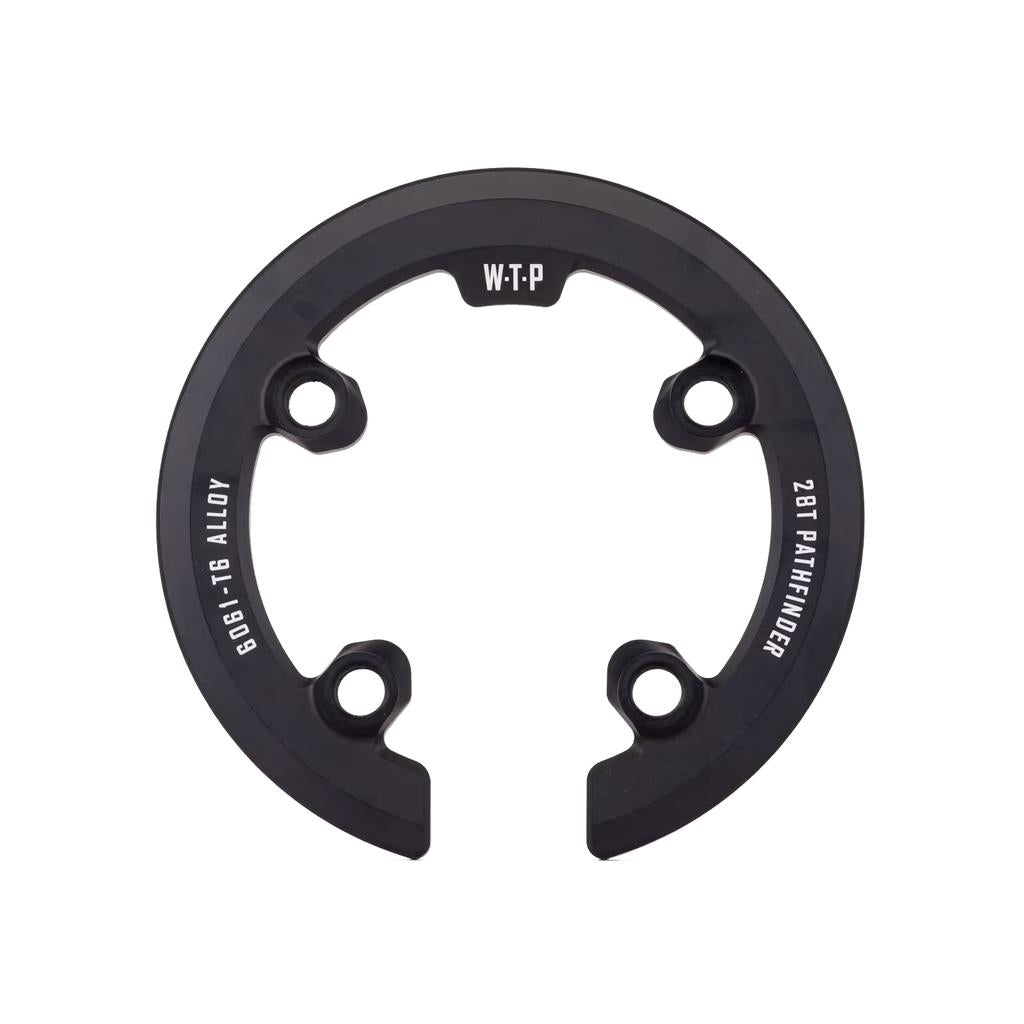 The Wethepeople Pathfinder Sprocket Guard (28T) is a black, circular 6061-T6 alloy guard with three bolt holes and a partial cutout, providing durable protection for your Pathfinder sprocket.