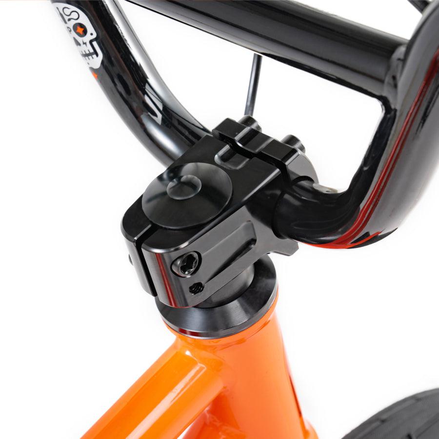 A close up of the handlebar on a Wethepeople Prime Drive 12 Inch Bike.