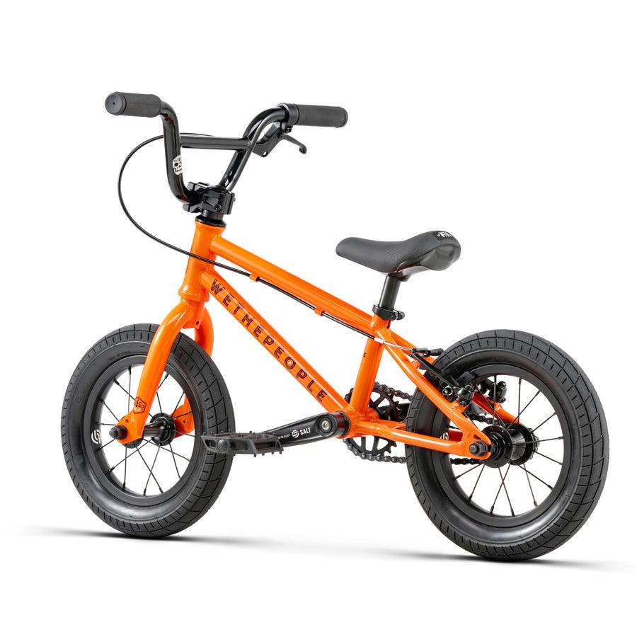 A featherweight Wethepeople Prime Drive 12 Inch Bike on a white background.