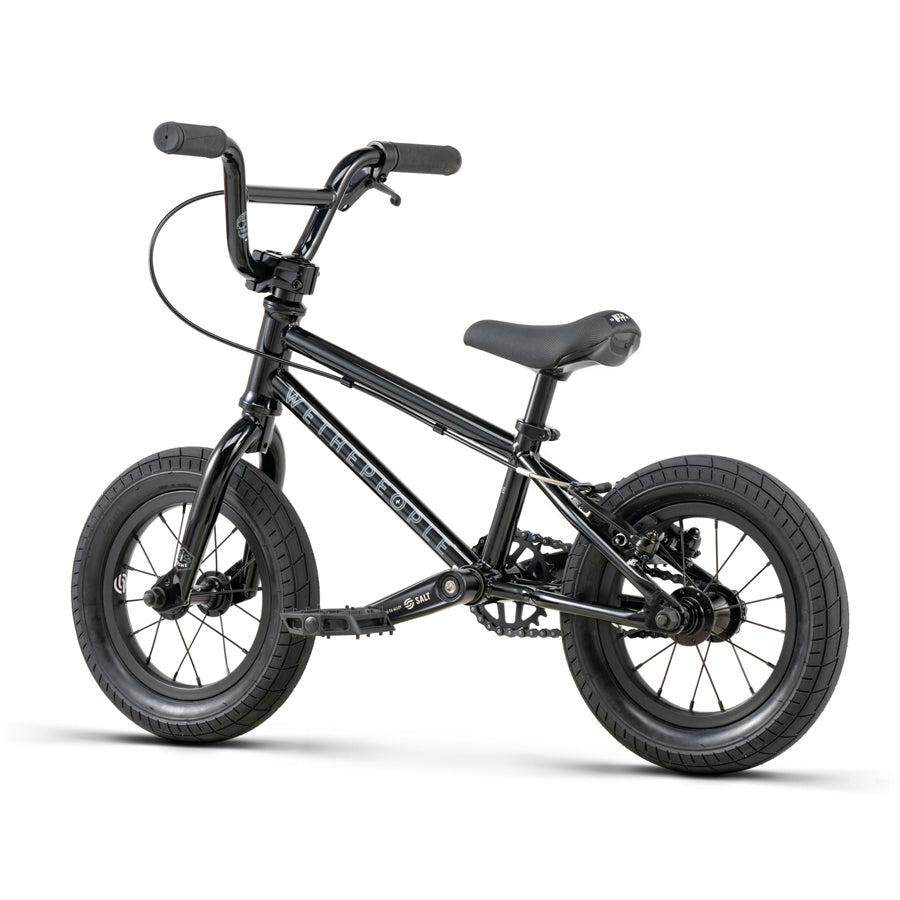 A Wethepeople Prime Drive 12 Inch Bike with a black frame on a white background.