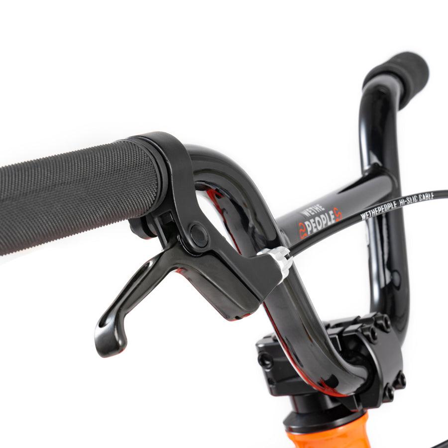 A close up of the handlebar on a Wethepeople Prime Drive 12 Inch Bike.