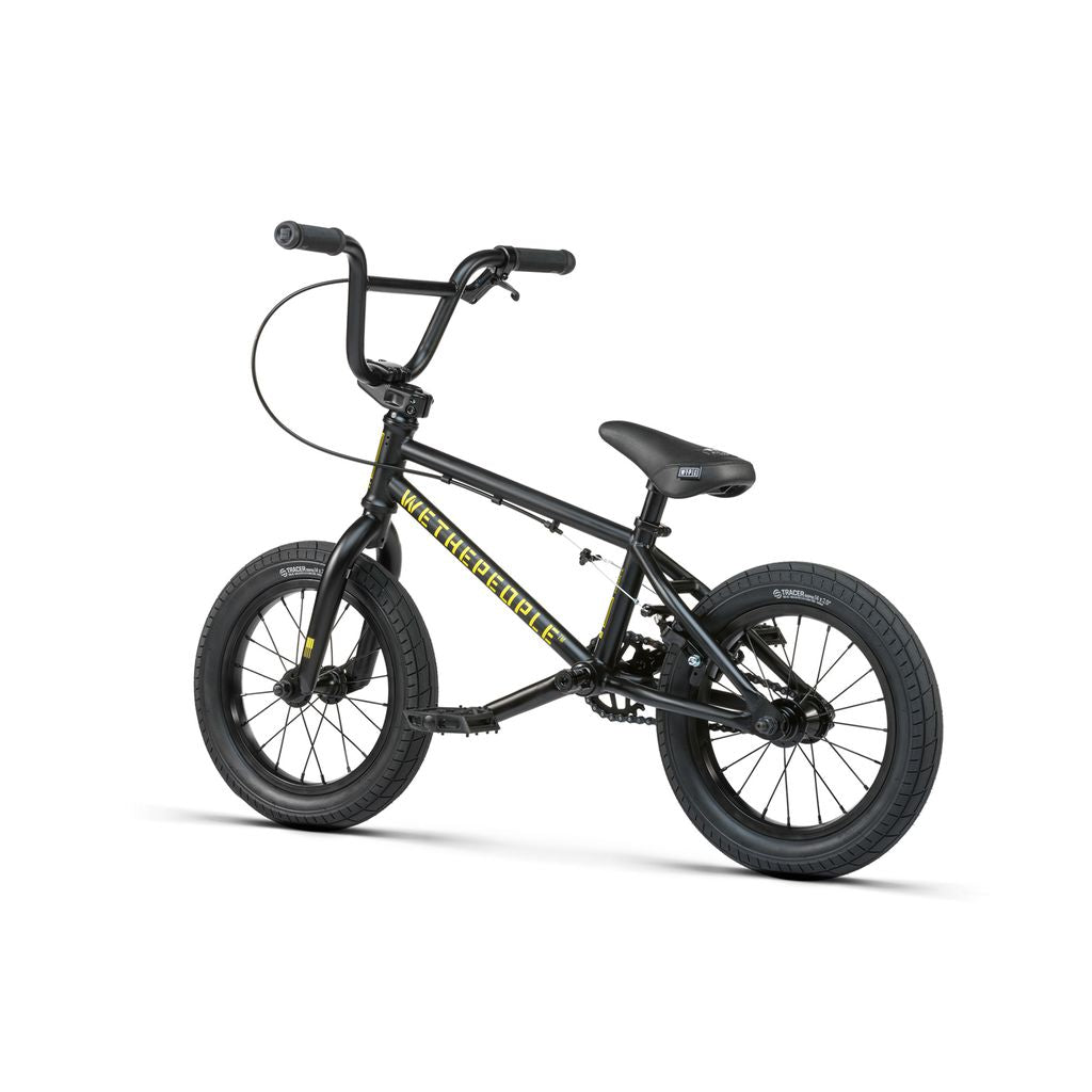 The Wethepeople Riot 14 Inch Bike is a small black BMX with thick tires, upright handlebars, a black seat, and durable Chromoly cranks, shown on a white background.