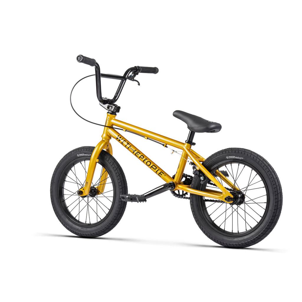 The Wethepeople Seed 16 Inch Bike is a yellow BMX-style bicycle, perfect for aspiring BMX riders, with black handlebars, seat, and pedals on a white background. The brand name stands out on the frame.
