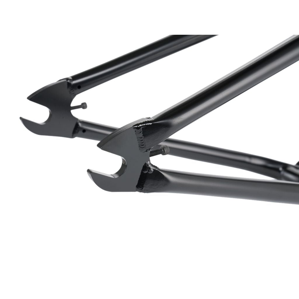 Close-up of the Wethepeople Trigger Frame in black, highlighting its rear dropouts and adaptive geometry.