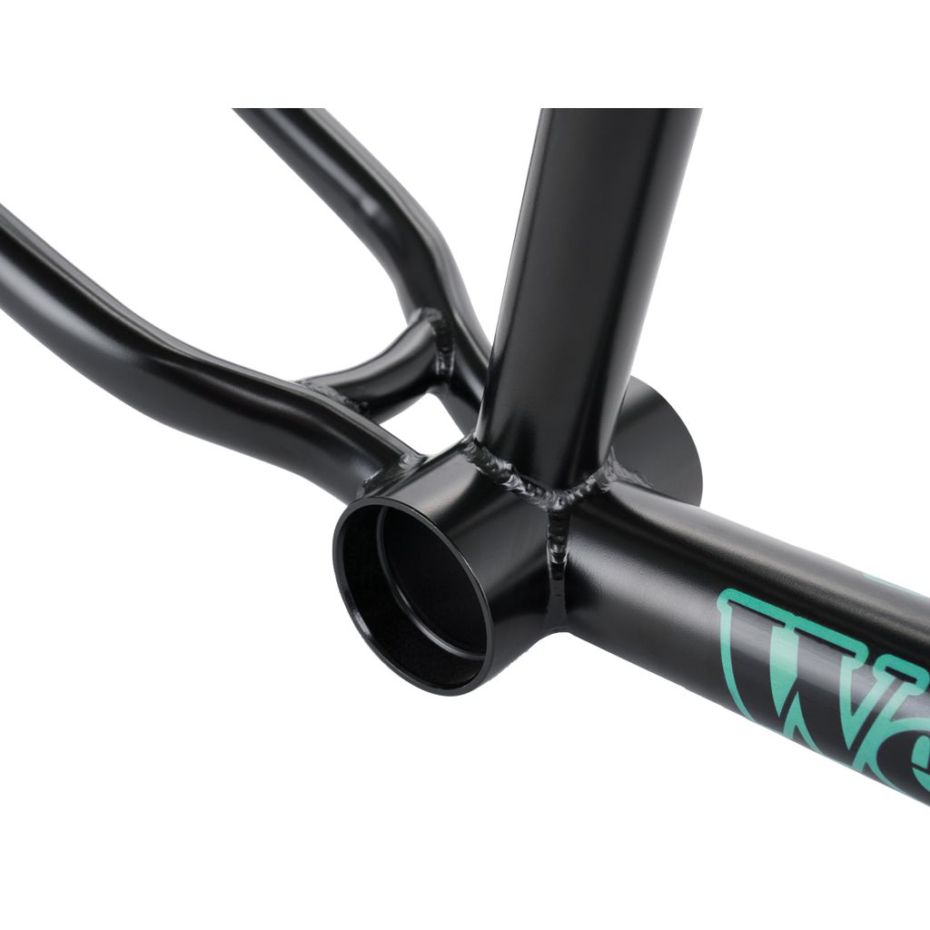 Close-up of the Wethepeople Trigger Frame in black, highlighting its durable welding joints and adorned with a turquoise logo from the WTP AM team.