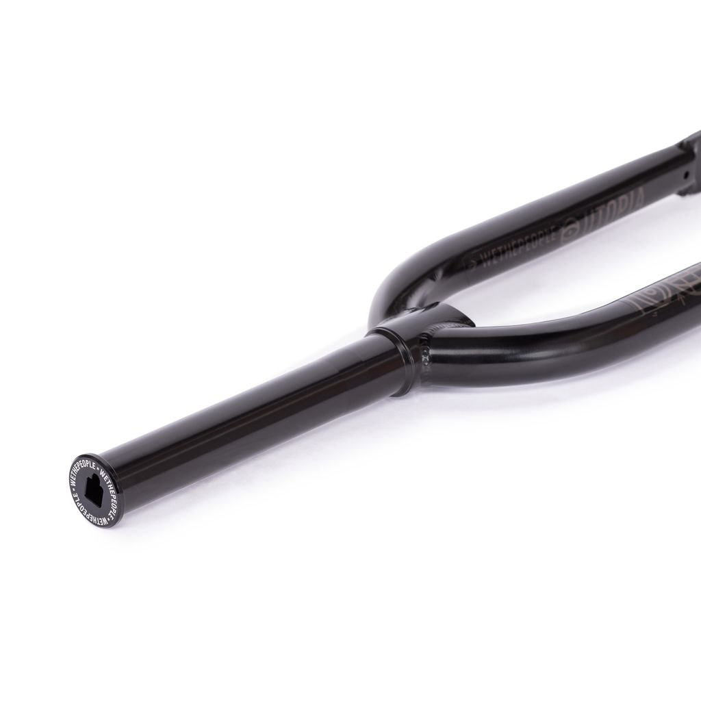 Close-up of the Wethepeople Utopia Zero Flatland Fork in black, showcasing a shiny finish with the end of the zero-offset fork leg and a visible bolt hole.