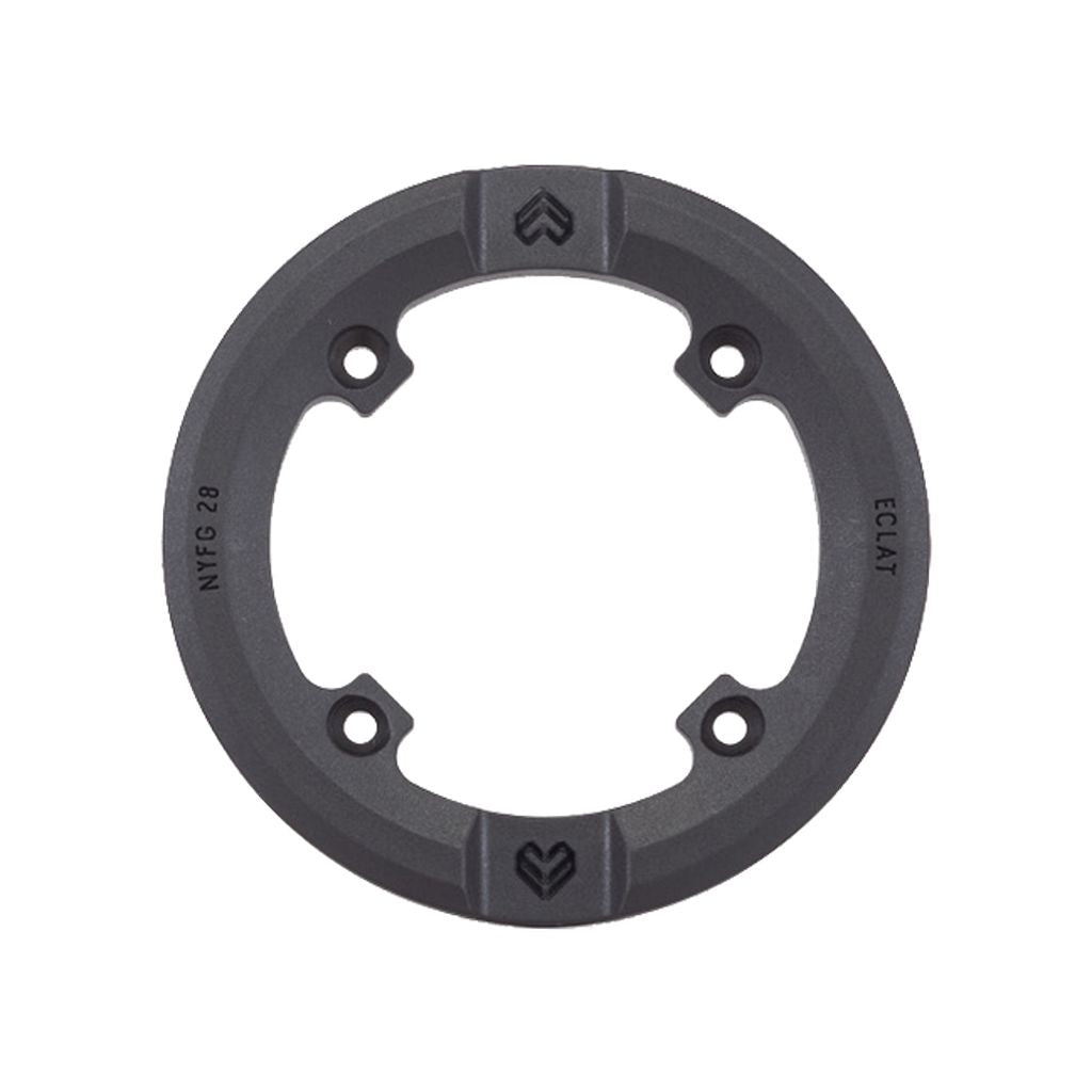 Circular black sprocket protector designed for bicycles, featuring four bolt holes and a nylon-fibreglass guard to ensure friction-free grinding. The text "Eclat" and "N.T.F.G 28" is displayed on the guard, which is compatible with AK and ELEVATE sprockets. This product is known as the Wethepeople Viper Sprocket Replacement Guard.