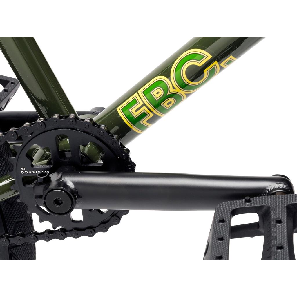 Close-up of a Fit Bike Co STR 20 Inch Bike (2026) crankset, pedal, and chainring on an olive green frame with "FBC" in yellow—built for modern street BMX riding.