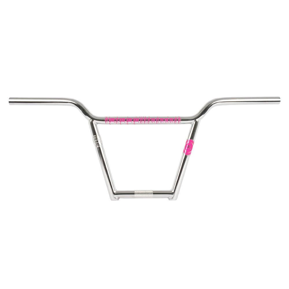 A silver Subrosa OM 4pc Bars BMX handlebar with a crossbar and pink grips on the center and right joint, shown against a white background.