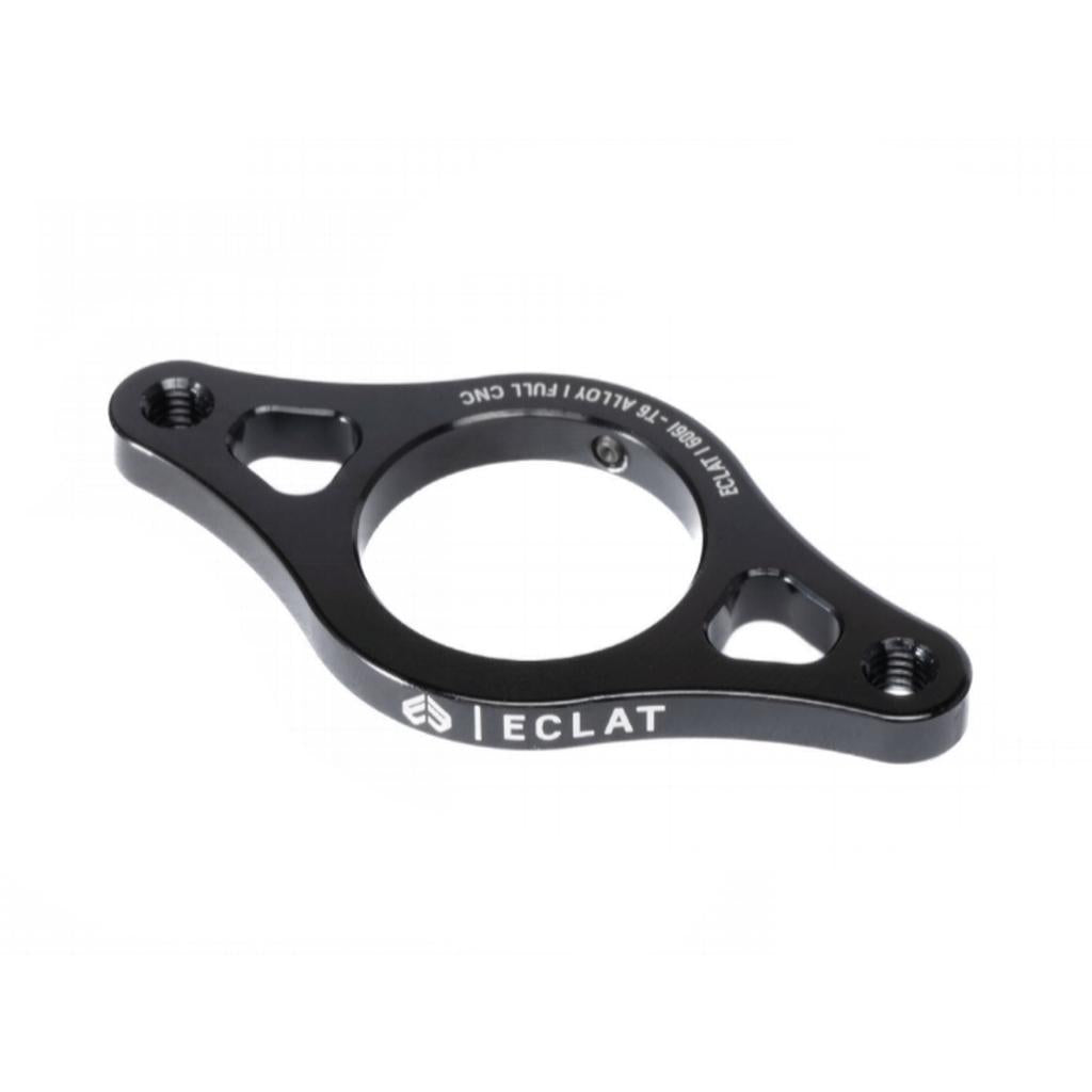 The Eclat Gyro Rotor Plate is a black CNC-machined metal alloy sprocket guard with three mounting holes and "ECLAT" branding on the side, displayed against a white background.