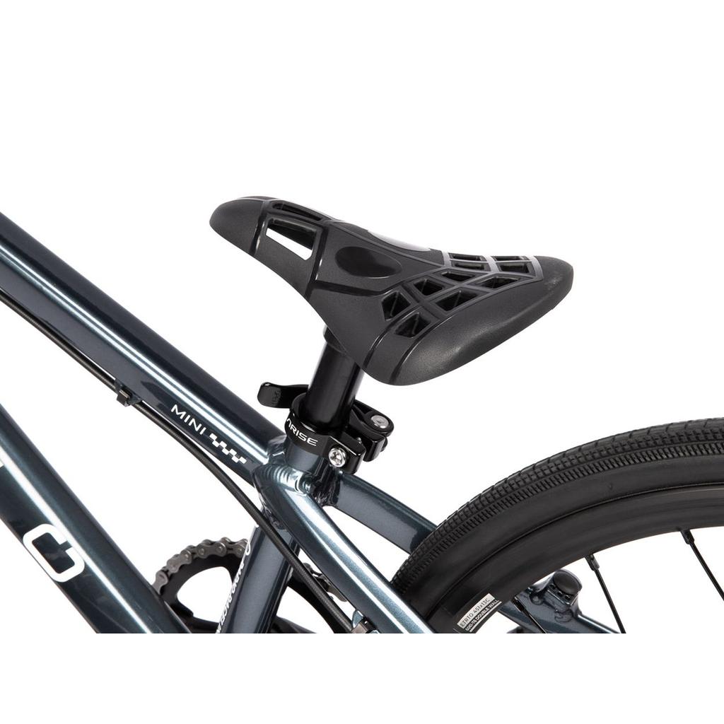 Close-up of the Radio Xenon Mini Disc 20 Inch Bike’s seat, seat post, and part of the rear wheel and tire attached to its hydroformed 6061-T6 alloy frame, highlighting features of this lightweight BMX model.
