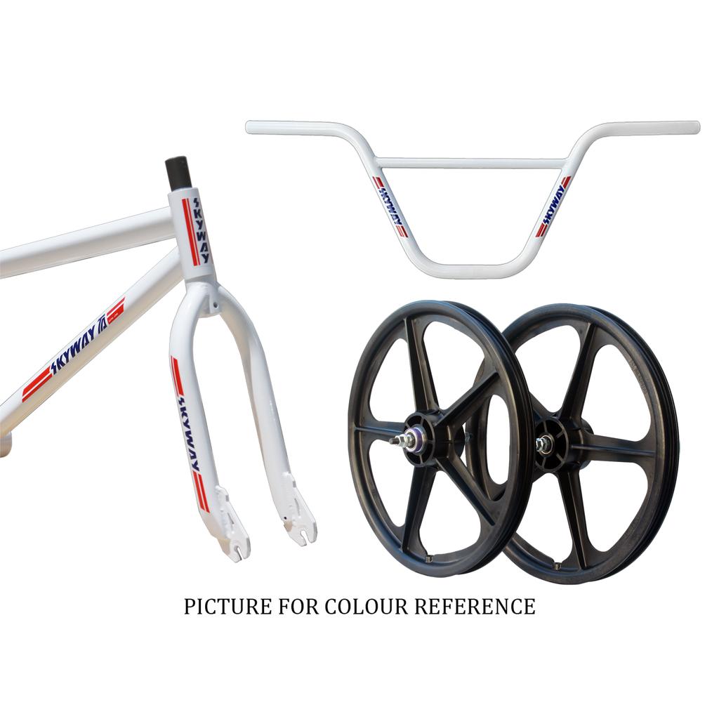 Skyway TA 20 Replica 20 Inch Bike (2026): White BMX frame, fork, and handlebar with red/blue graphics; black mag wheels with Comp 3 gum wall tires. "Picture for Colour Reference.