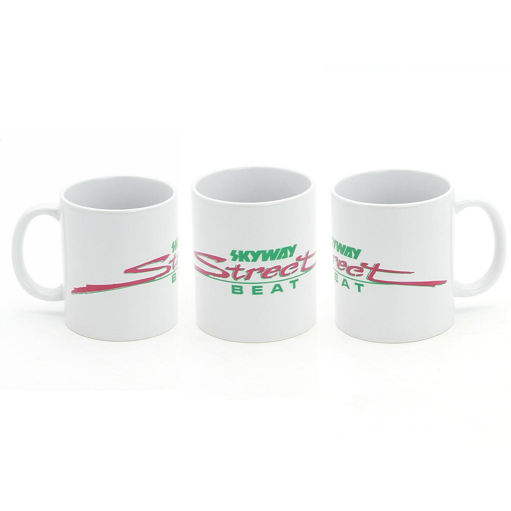 Three white 12oz Skyway Street Beat Coffee Mugs are displayed side by side, each featuring a green and pink "SKYWAY Street BEAT" logo.